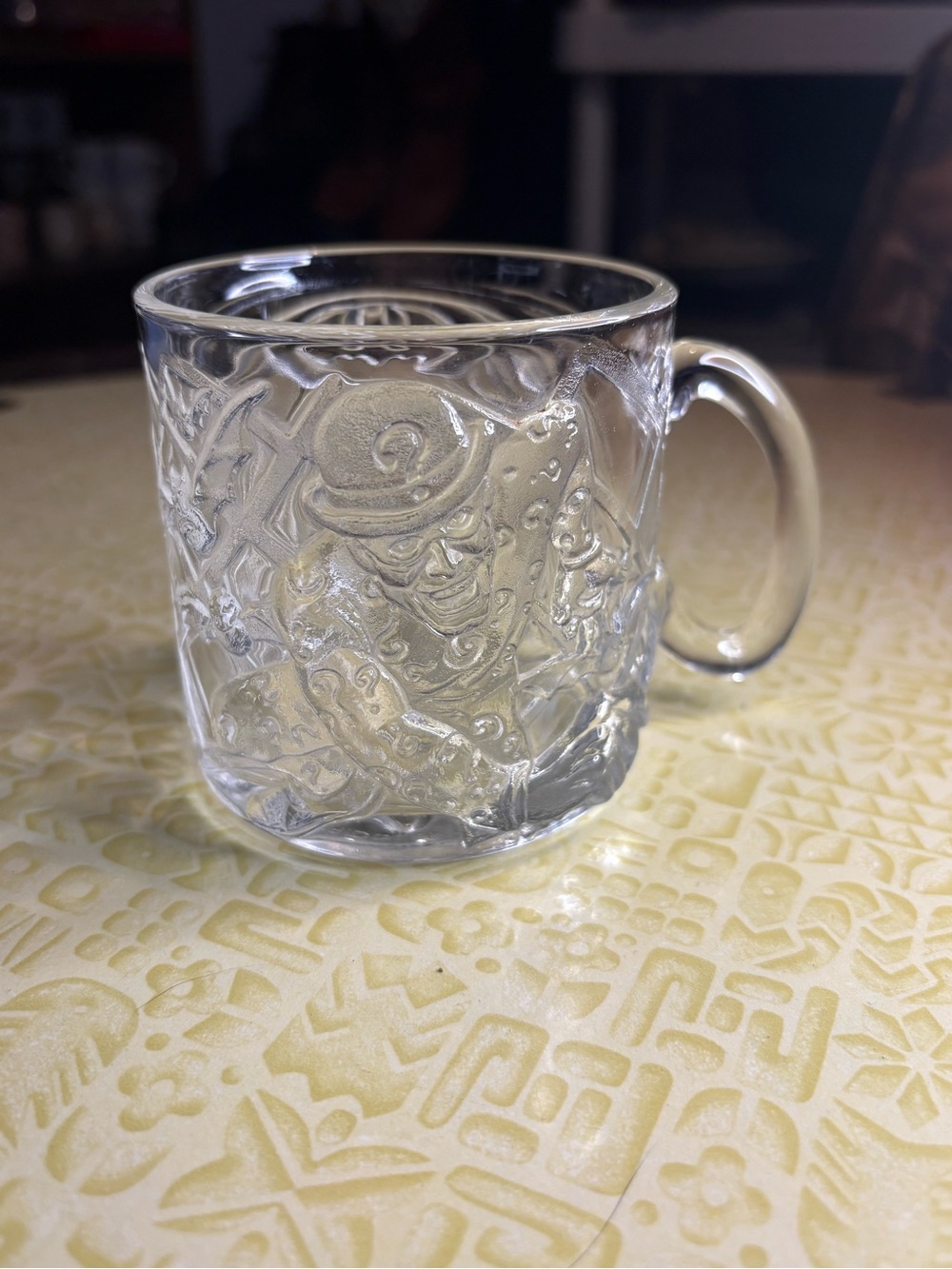 Vintage Joker Clear Glass Mug with Intricate Relief Design
